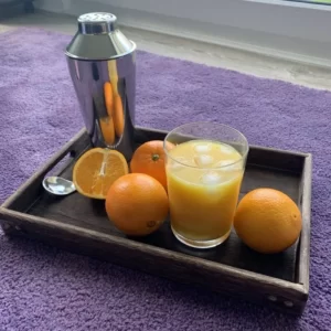 Orange Oasis cóctel servido en Vaso Highball