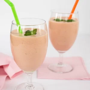 Banana Cantaloupe Smoothie cocktail served in a Highball Glass