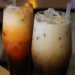 Thai Coffee cocktail served in a Highball glass