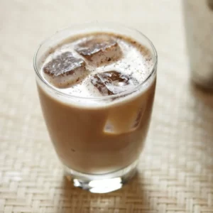 Coffee-Vodka cocktail served in a Collins Glass