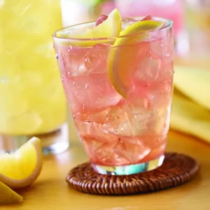 Pink Panty Pulldowns cocktail served in a Collins Glass