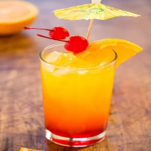Tequila Sunrise cocktail served in a Highball glass