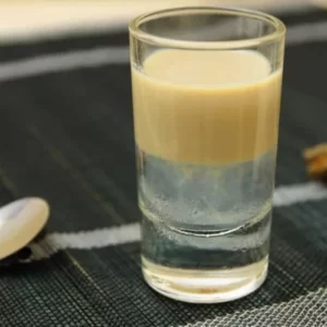 Slippery Nipple cocktail served in a Shot glass