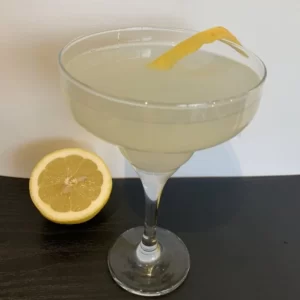 Bee's Knees cocktail served in a Martini Glass