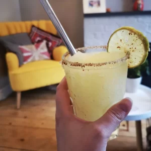 Pineapple Paloma cocktail served in a Collins glass