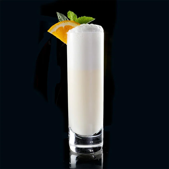 Ramos Gin Fizz cocktail served in a Highball glass