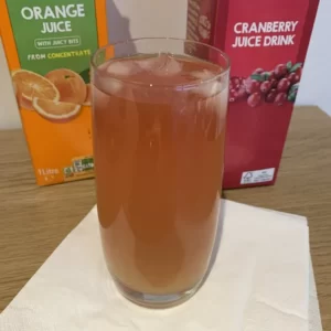 Affair cocktail served in a Highball glass